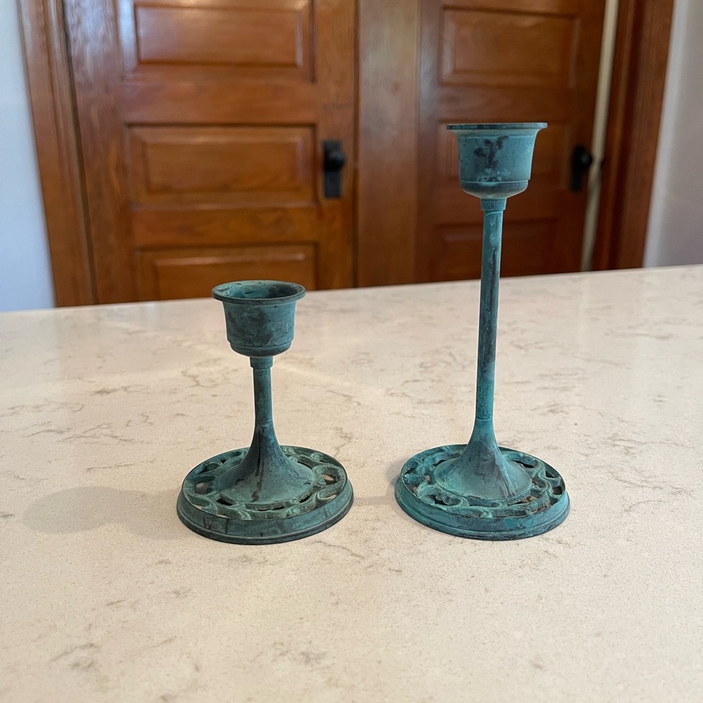 Teal metal candle stick holders